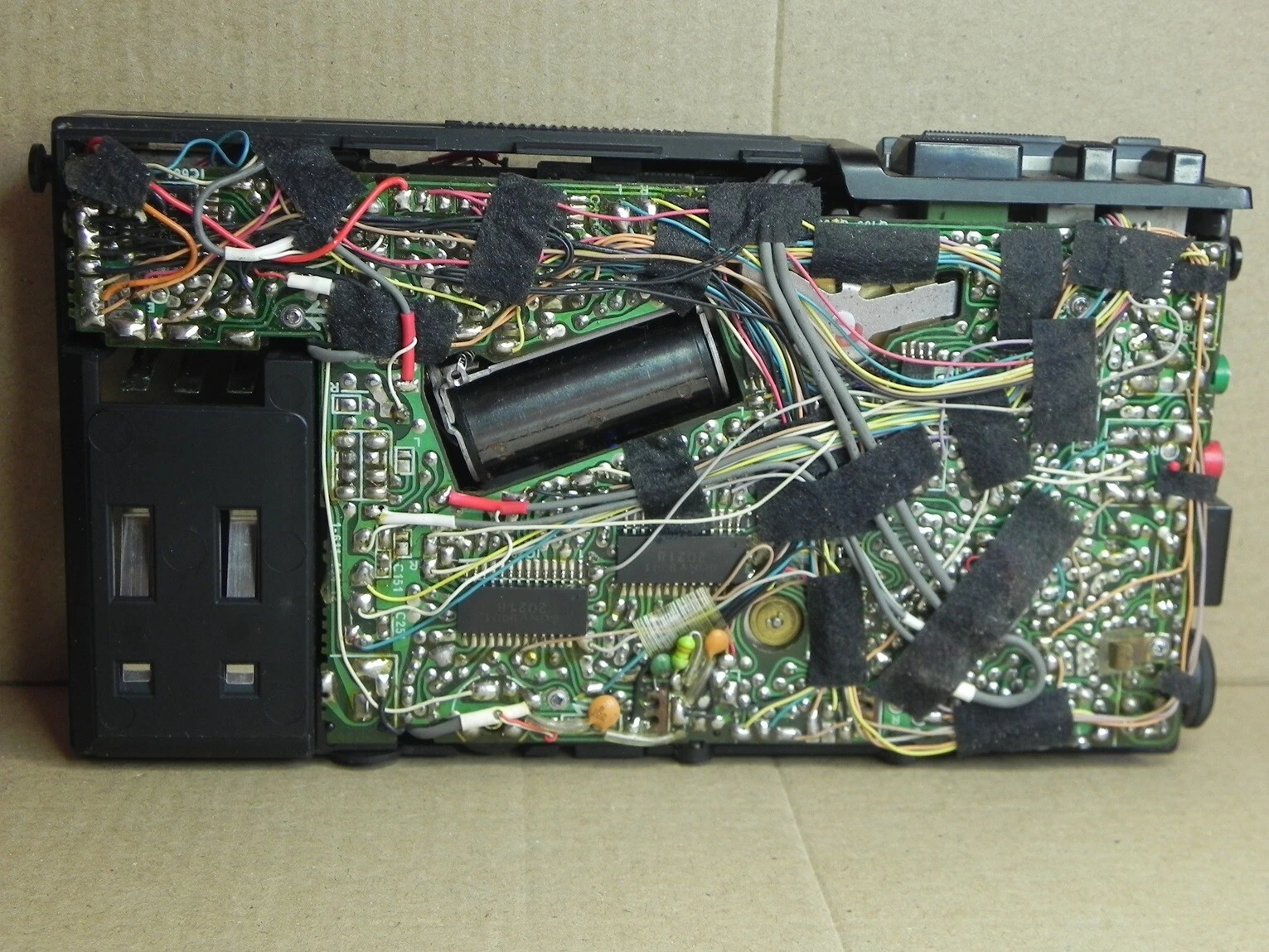 An ebay picture of a Sony WM-D6C with its back removed. An ebay picture of a Sony WM-D6C with its back removed.