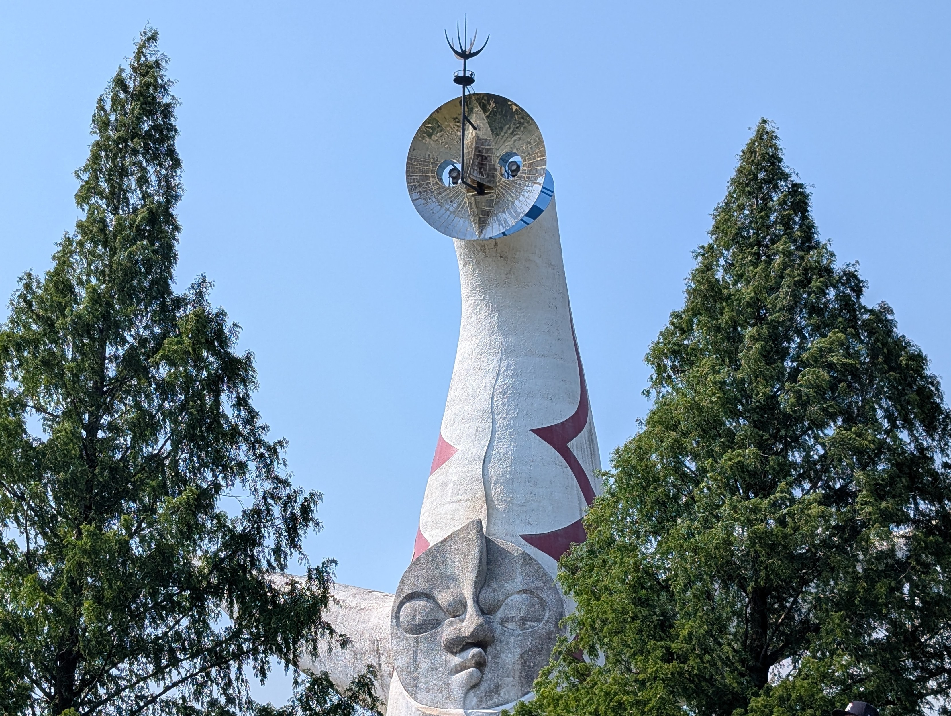 I don't really know how to describe this. I'll just link to the wiki page: https://en.wikipedia.org/wiki/Tower_of_the_Sun