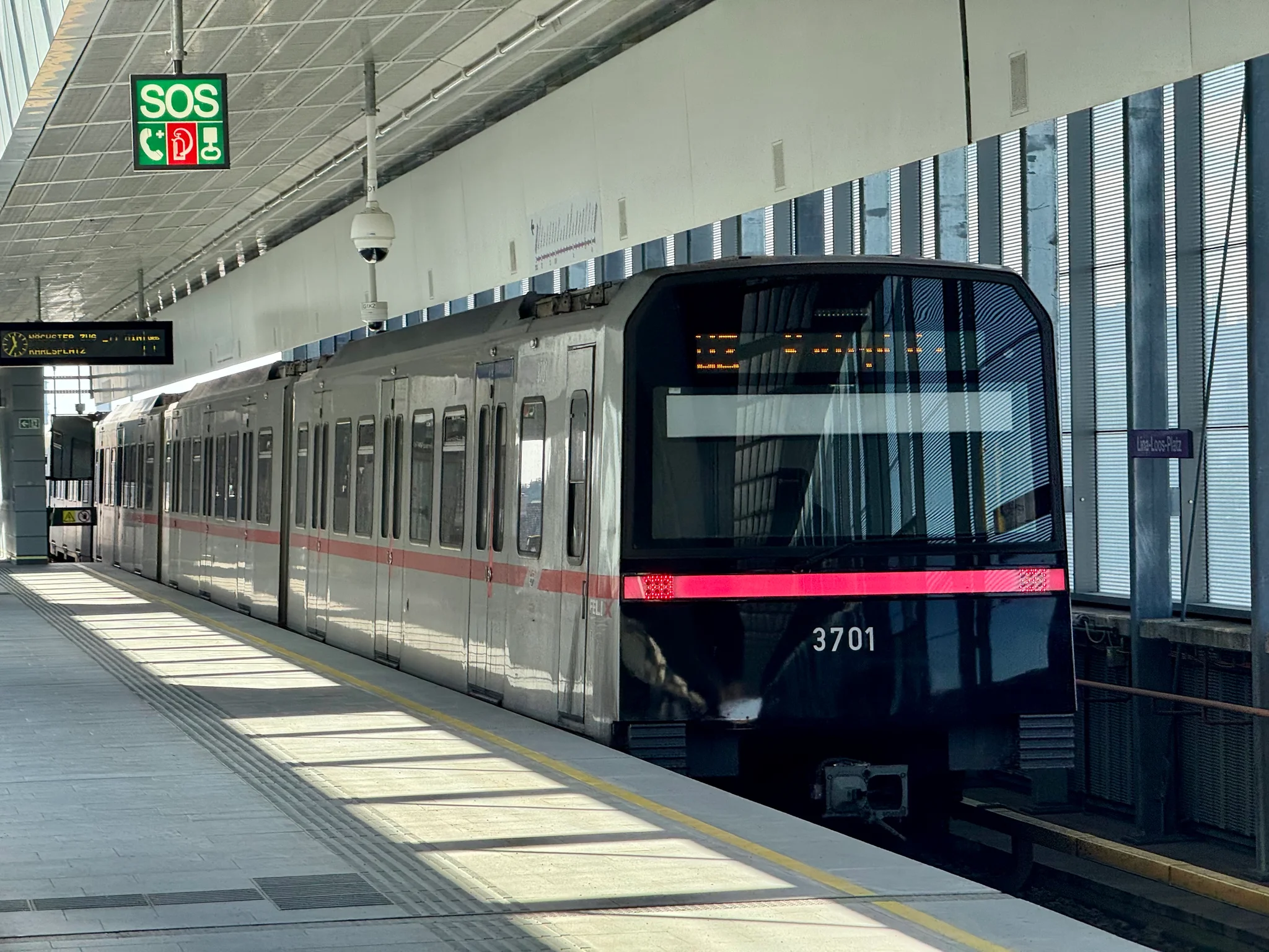 An X-type train departing the station.