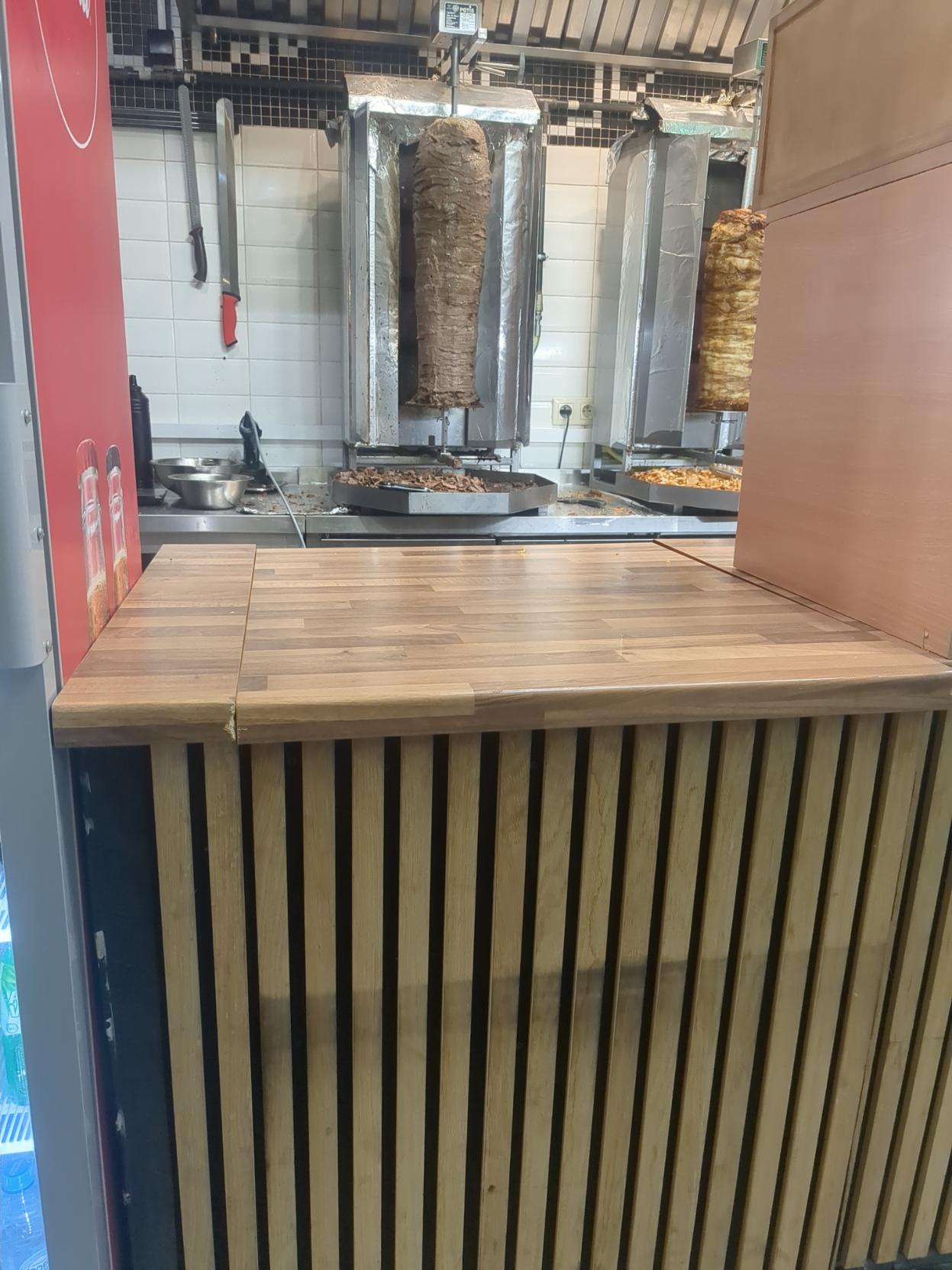 picture of a kebab place, the two must skewers are clearly visible picture of a kebab place, the two must skewers are clearly visible