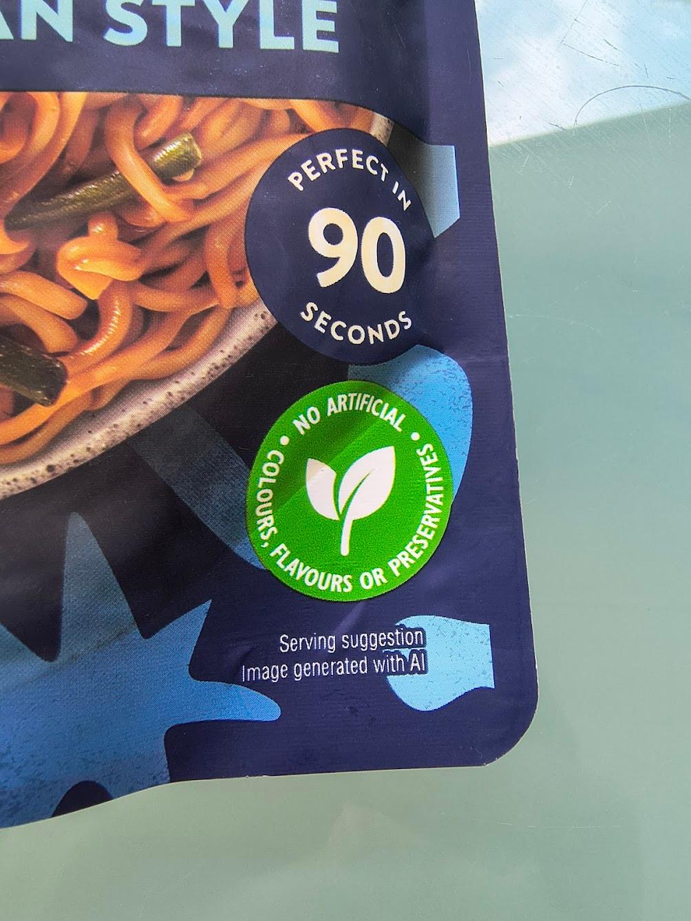 A close-up of the note reading "Serving Suggestion. Image generated with AI." A close-up of the note reading "Serving Suggestion. Image generated with AI."